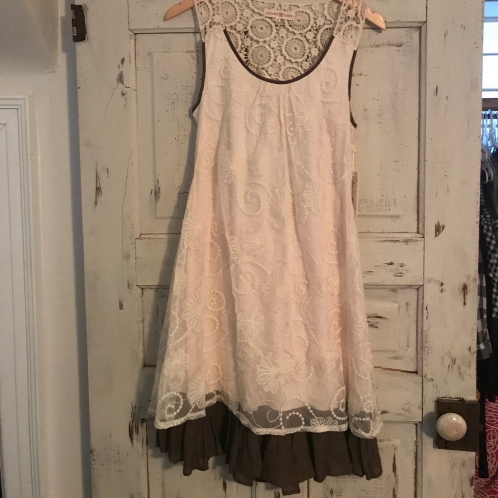 Beautiful backless lace cream dress.